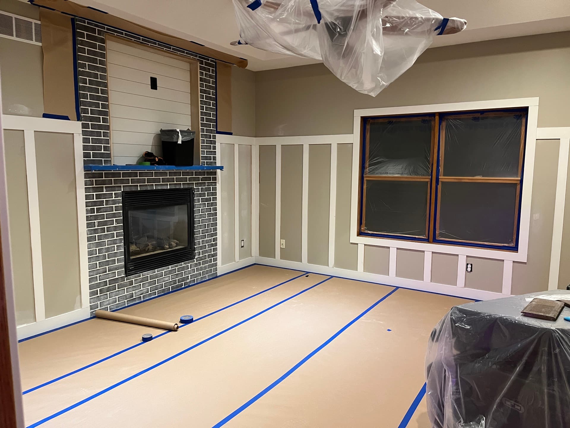 Fireplace and living room renovation by Seeger & Co