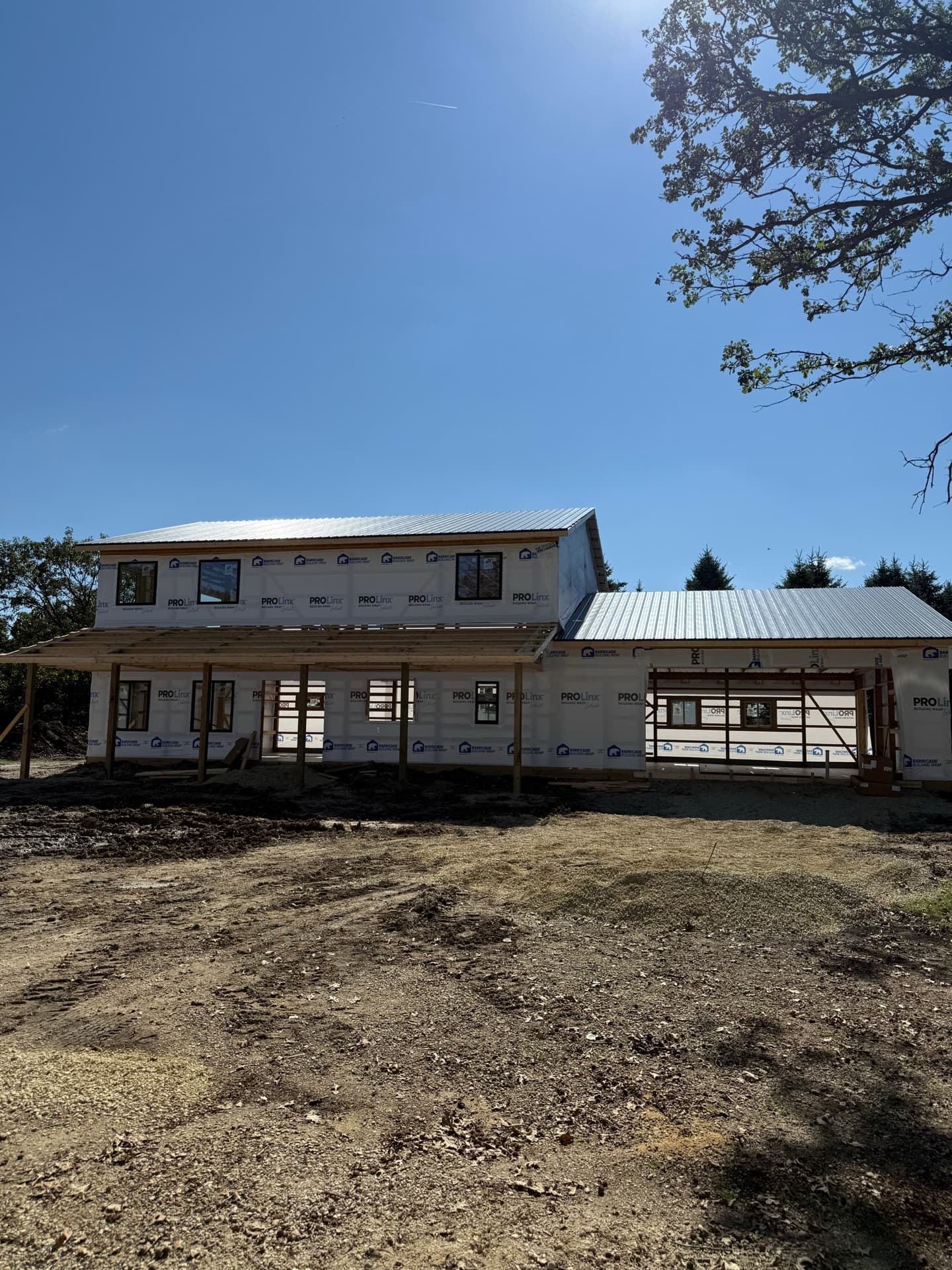 Custom barndominium exterior with garage